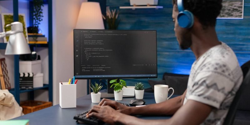 african-american-coder-employee-programming-business-code-1.jpg african-american-coder-employee-programming-business-code-1.jpg