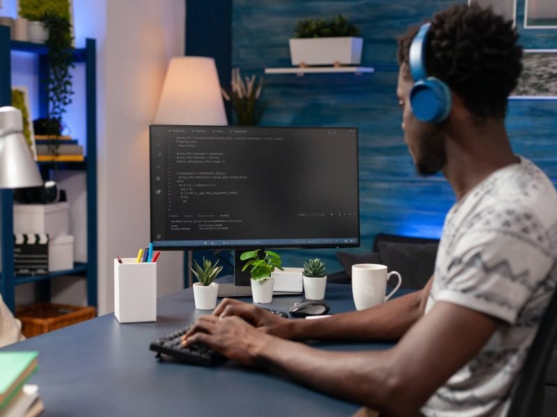 african-american-coder-employee-programming-business-code-1.jpg african-american-coder-employee-programming-business-code-1.jpg