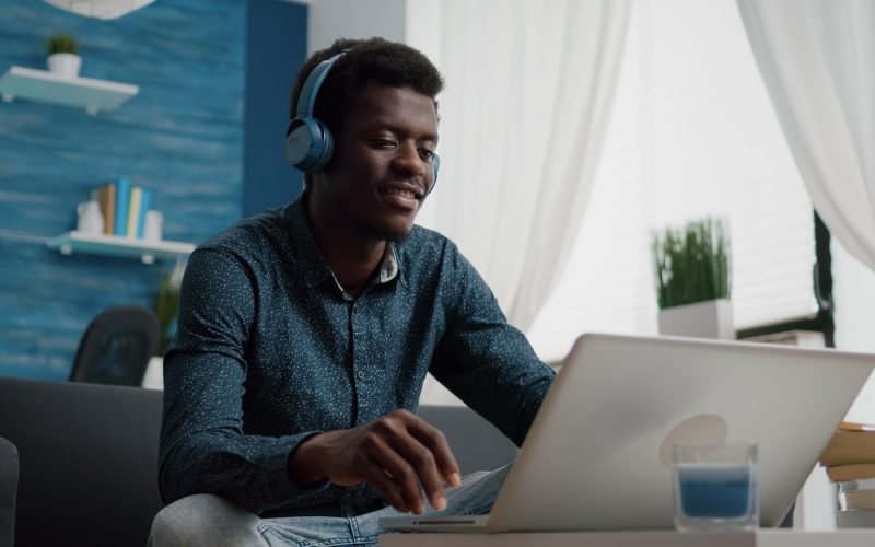 african-american-man-with-headphone-on-watching-movie-on-streaming-services.jpg