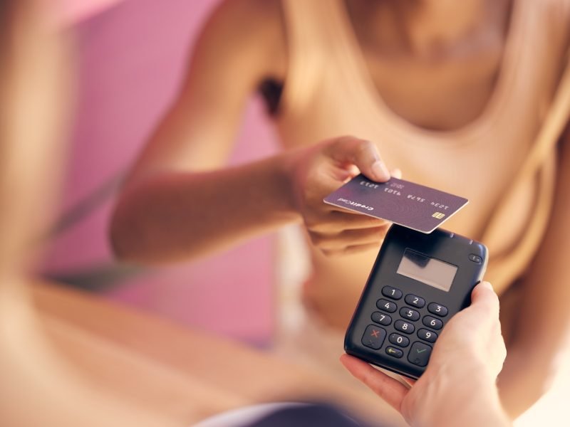 credit-card-retail-customer-and-rfid-payment-at-cashier-store-service-and-point-of-sale-machine-.jpg